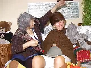 Two very old and saggy grannies and on their couch. These whores may be old but they are still lustful so without much talking the bitches take off their clothes and begin some tits licking and pussy rubbing action. Look at the old whores, think they can handle a hard fuck?